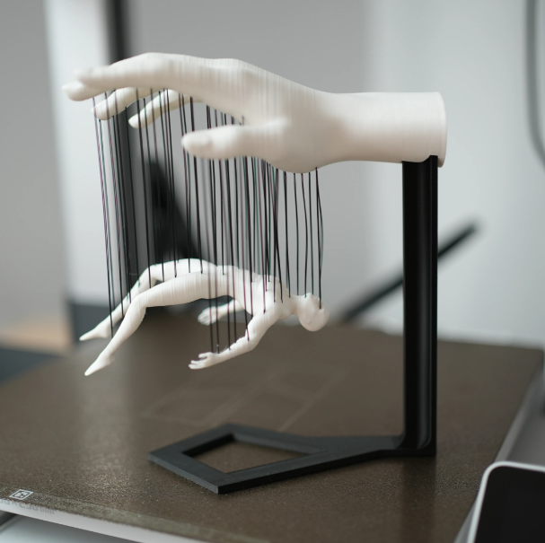 Human Marionette Sculpture